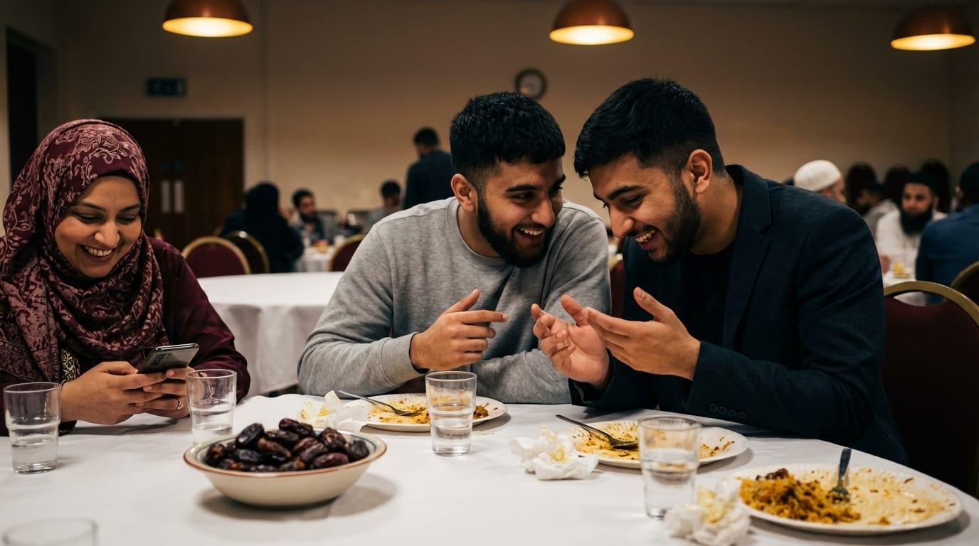 Friends leaning in over dinner at a fundraising gala